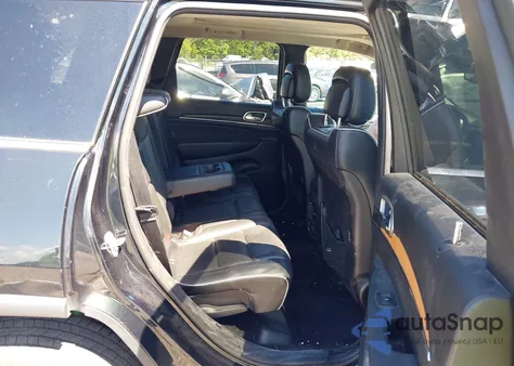 2013 Jeep Grand Cherokee Overland z USA, uszkodzony, nr VIN 1C4RJFCT8DC525390